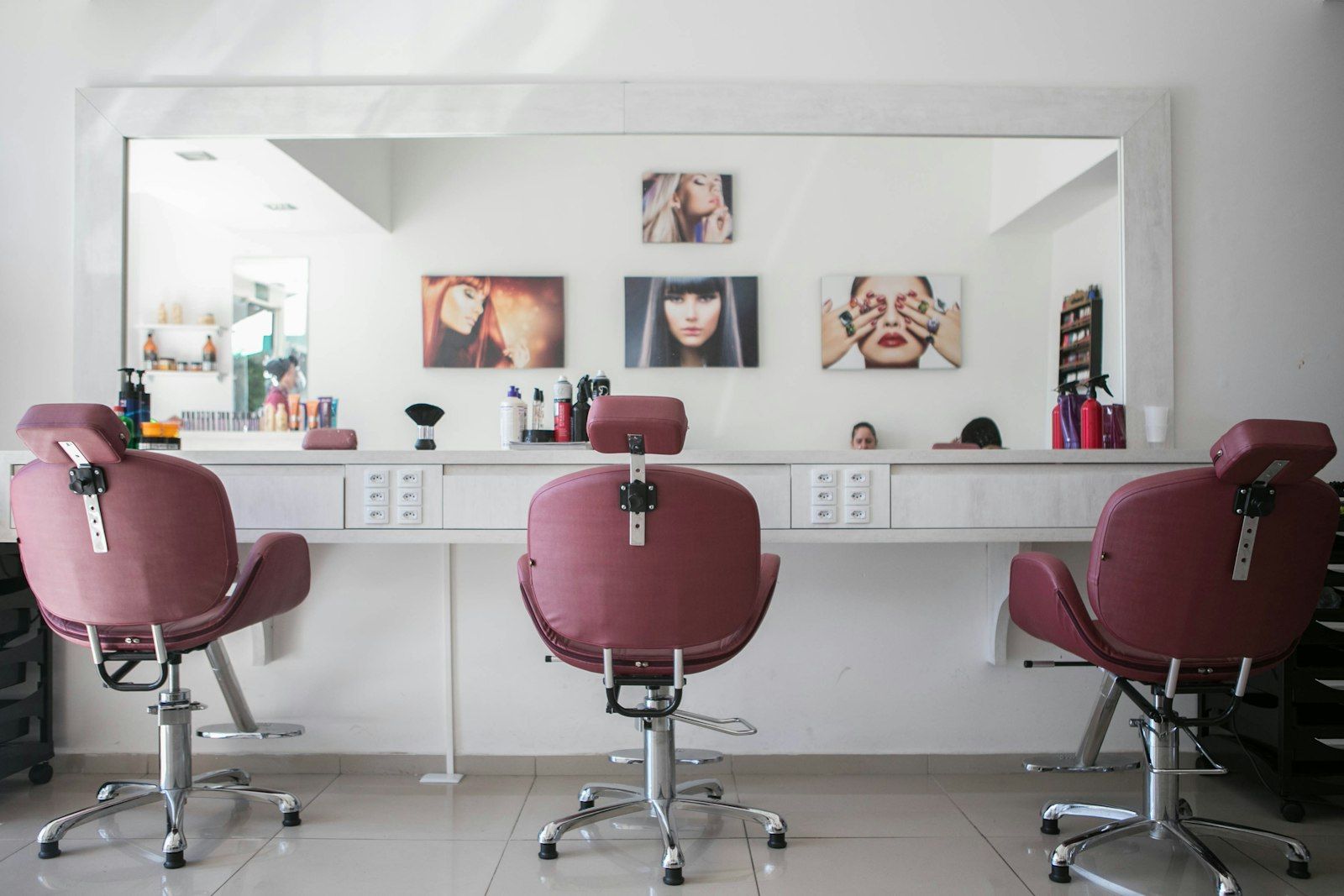 The mirror room with rose velvet chairs